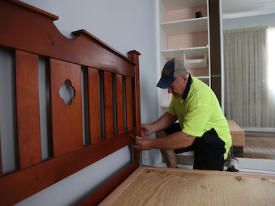 Cincinnati Movers putting bed back together